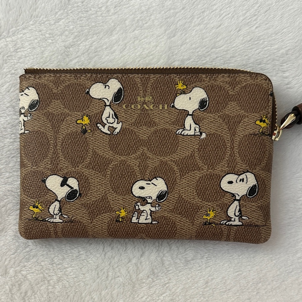 Coach Brown Wristlet with Snoopy and Woodstock